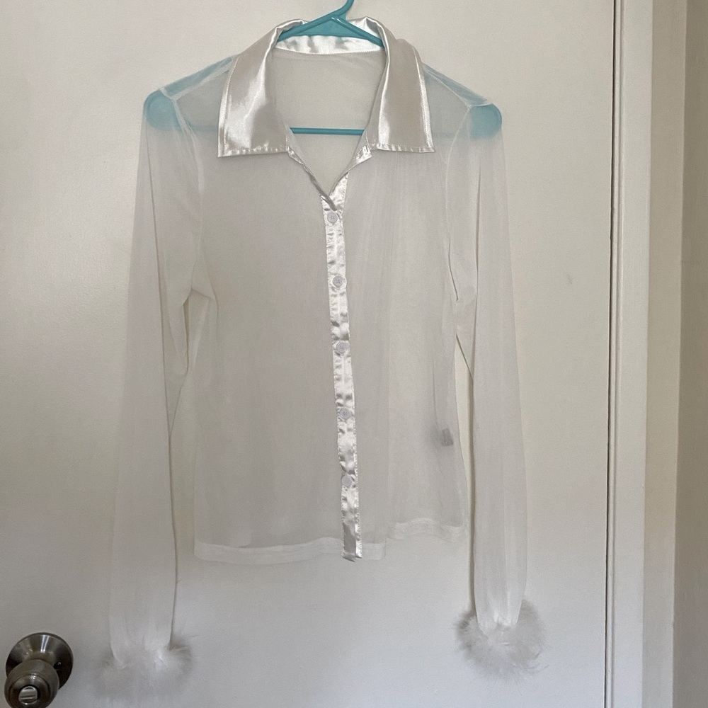 Sheer blouse with feathers